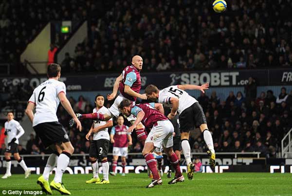 collins heads in at the fa cup clash