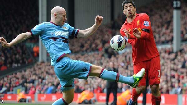 Collins getting stuck in with Suarez